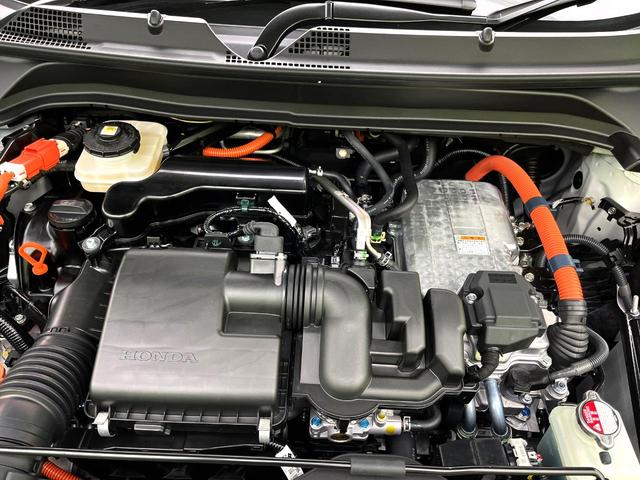 ヴェゼル ｅ：ＨＥＶ　Ｚ　登録済未使用車　純正７インチナビ　バックカメラ　アダプティブクルーズコントロール　ＬＥＤヘッドライト　純正１８インチアルミ　ハーフレザーシート　パワーバックドア　コーナーセンサー　ＥＴＣ（18枚目）