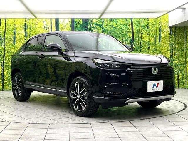 ヴェゼル ｅ：ＨＥＶ　Ｚ　登録済未使用車　ホンダコネクトディスプレイ　バックカメラ　ＥＴＣ２．０　ホンダセンシング　レーダークルーズ　電動リアゲート　置くだけ充電　ＬＥＤヘッドライト　純正１８インチアルミホイール　禁煙車（16枚目）