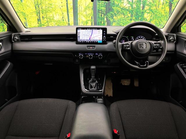 ヴェゼル ｅ：ＨＥＶ　Ｘ　純正９型ナビ　禁煙車　バックカメラ　ホンダセンシング　パドルシフト　スマートキー　ワイヤレス充電器　コーナーセンサー　純正１６インチアルミ　オートエアコン　オートブレーキホールド　ＥＴＣ（2枚目）