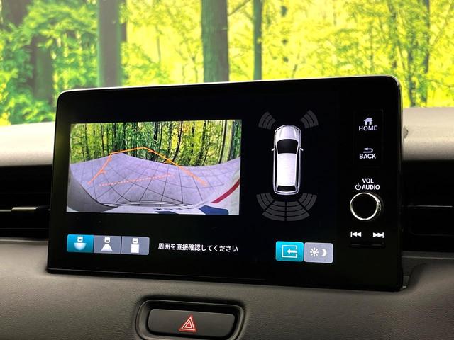 ヴェゼル ｅ：ＨＥＶ　Ｘ　純正９型ナビ　禁煙車　バックカメラ　ホンダセンシング　パドルシフト　スマートキー　ワイヤレス充電器　コーナーセンサー　純正１６インチアルミ　オートエアコン　オートブレーキホールド　ＥＴＣ（4枚目）