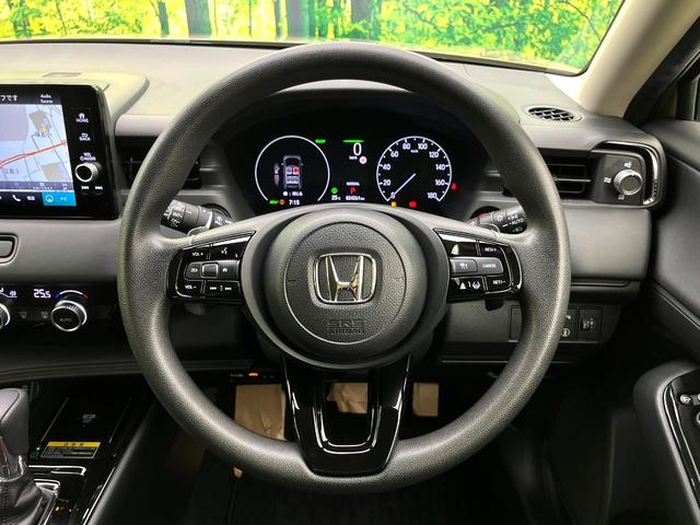 ヴェゼル ｅ：ＨＥＶ　Ｘ　純正９型ナビ　禁煙車　バックカメラ　ホンダセンシング　パドルシフト　スマートキー　ワイヤレス充電器　コーナーセンサー　純正１６インチアルミ　オートエアコン　オートブレーキホールド　ＥＴＣ（11枚目）