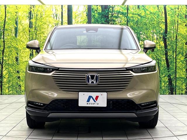 ヴェゼル ｅ：ＨＥＶ　Ｘ　純正９型ナビ　禁煙車　バックカメラ　ホンダセンシング　パドルシフト　スマートキー　ワイヤレス充電器　コーナーセンサー　純正１６インチアルミ　オートエアコン　オートブレーキホールド　ＥＴＣ（14枚目）