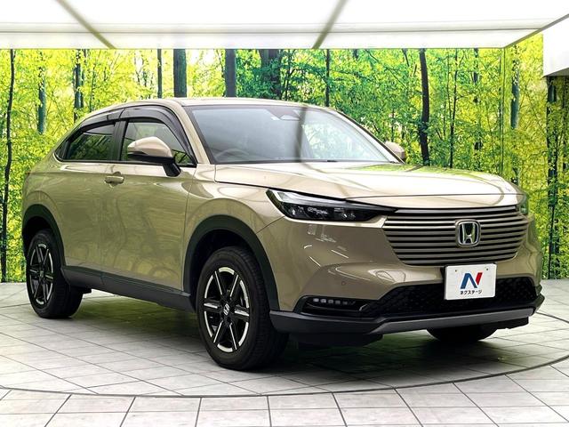 ヴェゼル ｅ：ＨＥＶ　Ｘ　純正９型ナビ　禁煙車　バックカメラ　ホンダセンシング　パドルシフト　スマートキー　ワイヤレス充電器　コーナーセンサー　純正１６インチアルミ　オートエアコン　オートブレーキホールド　ＥＴＣ（16枚目）