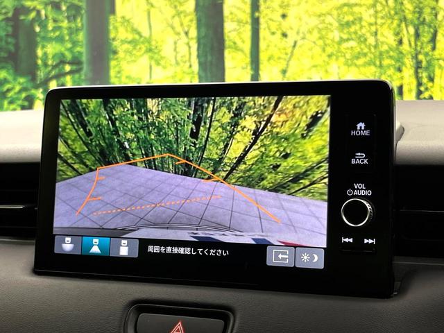 ヴェゼル ｅ：ＨＥＶ　Ｘ　純正９型ナビ　禁煙車　バックカメラ　ホンダセンシング　パドルシフト　スマートキー　ワイヤレス充電器　コーナーセンサー　純正１６インチアルミ　オートエアコン　オートブレーキホールド　ＥＴＣ（32枚目）
