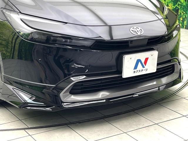 プリウス Z モデリスタエアロ 禁煙車 純正12.3インチナビ 全周囲カメラ シートベンチレーション デジタルインナーミラー ブラインドスポット パワーバックドア 純正19インチアルミ シートメモリー LEDヘッド(69枚目)