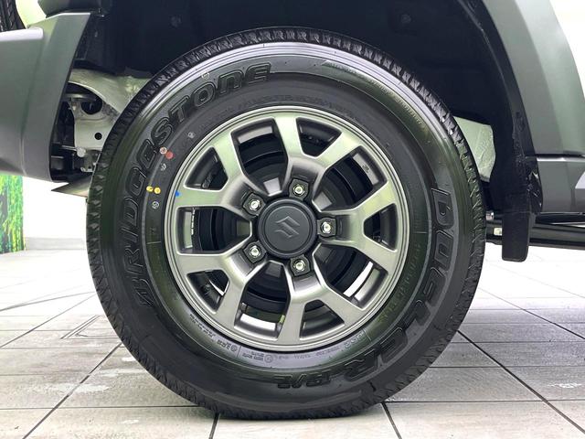 ジムニーノマド FC 禁煙車 純正ディスプレイオーディオ バックカメラ セーフティサポート レーダークルーズコントロール シートヒーター オートエアコン オートライト 電動格納ミラー 純正15インチアルミ LEDヘッド(56枚目)