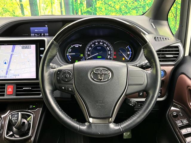 エスクァイア ハイブリッドＧｉ　プレミアムパッケージ　フリップダウンモニター　純正１０インチナビ　バックカメラ　トヨタセーフティセンス　両側パワースライドドア　シートヒーター　ステアリングヒーター　ドライブレコーダー　スマートキー　ＬＥＤヘッドライト（11枚目）