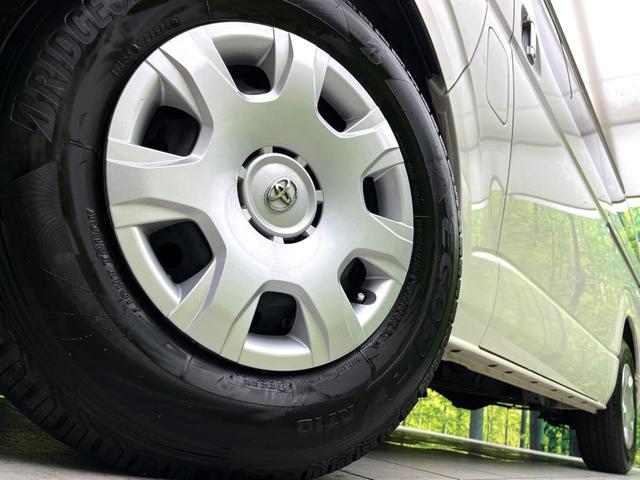 ハイエースバン ロングスーパーGL 純正SDナビ バックカメラ 衝突軽減ブレーキ 車線逸脱警報装置 ETC オートエアコン bluetooth再生 キーレス 電動格納ドアミラー オートマチックハイビーム 純正15インチホイール 禁煙車(13枚目)