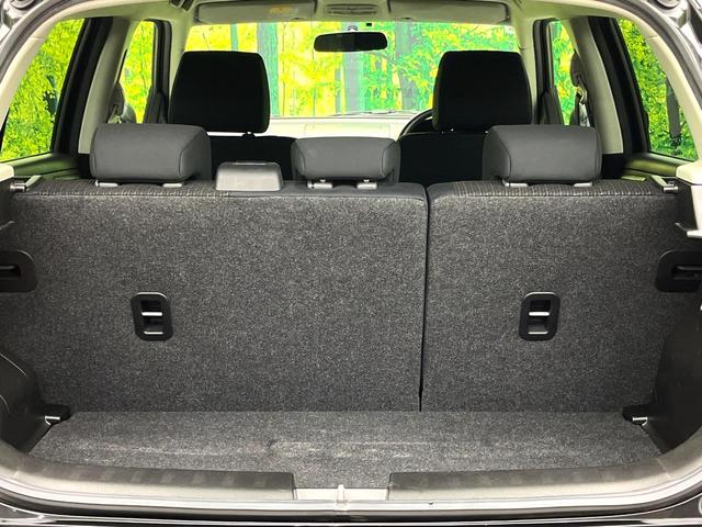 スイフト ＸＧ　禁煙車　ＫＥＮＷＯＯＤナビ　ＣＤ　ＤＶＤ再生　ＬＥＤヘッドライト　オートエアコン　スマートキー　１５インチアルミホイール　電動格納ミラー　横滑り防止装置　フロアマット（10枚目）