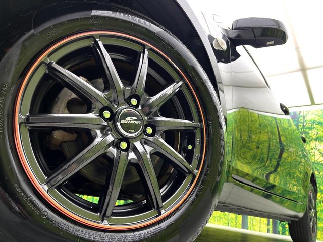 スイフト ＸＧ　禁煙車　ＫＥＮＷＯＯＤナビ　ＣＤ　ＤＶＤ再生　ＬＥＤヘッドライト　オートエアコン　スマートキー　１５インチアルミホイール　電動格納ミラー　横滑り防止装置　フロアマット（13枚目）