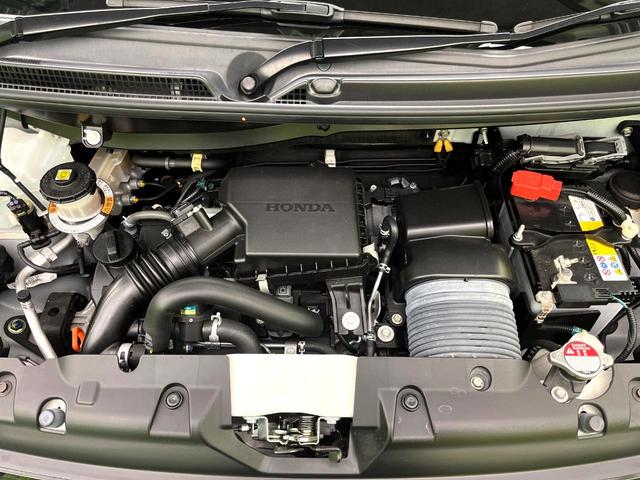 N-WGNカスタム L・ターボホンダセンシング パドルシフト 9インチナビ バックカメラ シートヒーター ETC 純正革巻きステアリング LEDヘッドライト 純正15インチアルミ Bluetooth再生 フルセグTV 電子パーキング 禁煙車(17枚目)