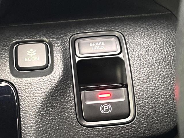 N-WGNカスタム L・ターボホンダセンシング パドルシフト 9インチナビ バックカメラ シートヒーター ETC 純正革巻きステアリング LEDヘッドライト 純正15インチアルミ Bluetooth再生 フルセグTV 電子パーキング 禁煙車(35枚目)