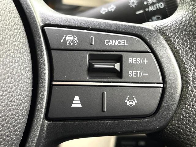 N-BOX ベースグレード 禁煙車 ホンダセンシング パワースライドドア アダプティブクルーズコントロール スマートキー オートライト LEDヘッド オートエアコン コーナーセンサー 純正14インチホイール 電動格納ミラー(5枚目)