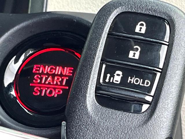 N-BOX ベースグレード 禁煙車 ホンダセンシング パワースライドドア アダプティブクルーズコントロール スマートキー オートライト LEDヘッド オートエアコン コーナーセンサー 純正14インチホイール 電動格納ミラー(6枚目)