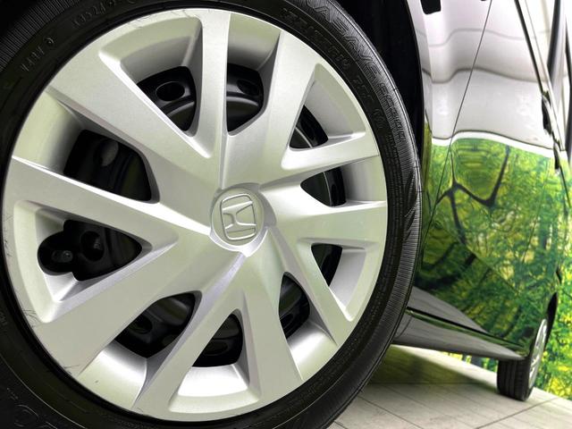 N-BOX ベースグレード 禁煙車 ホンダセンシング パワースライドドア アダプティブクルーズコントロール スマートキー オートライト LEDヘッド オートエアコン コーナーセンサー 純正14インチホイール 電動格納ミラー(13枚目)