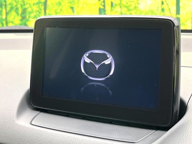 デミオ １３Ｓツーリング　５速ＭＴ　８型マツダコネクトナビ　バックカメラ　衝突軽減ブレーキシステム　スマートキー　ＬＥＤヘッド　純正１５インチアルミ　シートヒーター　オートエアコン　ＥＴＣ　オートライト　電動格納ミラー（4枚目）
