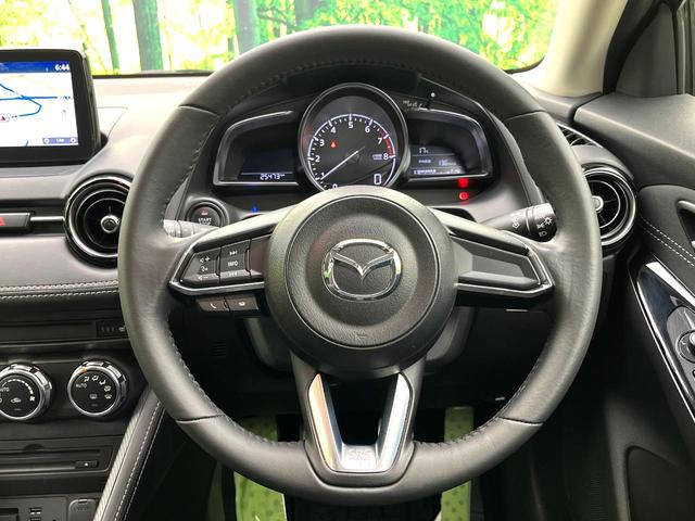 デミオ １３Ｓツーリング　５速ＭＴ　８型マツダコネクトナビ　バックカメラ　衝突軽減ブレーキシステム　スマートキー　ＬＥＤヘッド　純正１５インチアルミ　シートヒーター　オートエアコン　ＥＴＣ　オートライト　電動格納ミラー（11枚目）