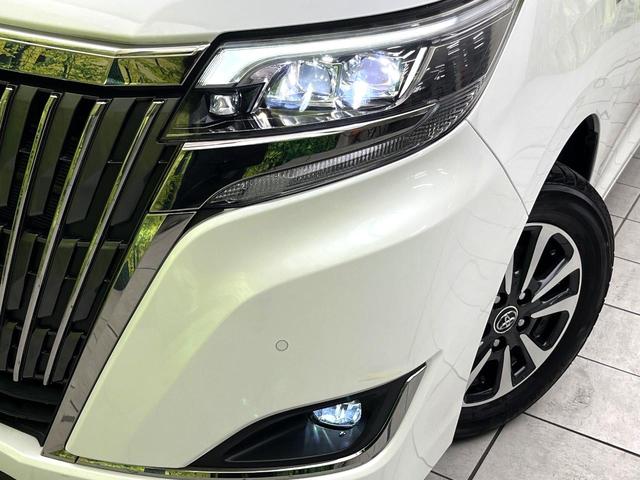 エスクァイア ハイブリッドGiプレミアムパッケジブラックテーラード 禁煙車 純正9型ナビ バックカメラ シートヒーター 両側電動スライドドア LEDヘッド セーフティセンス 純正15インチアルミ スマートキー ETC オートエアコン クルコン オートライト(12枚目)