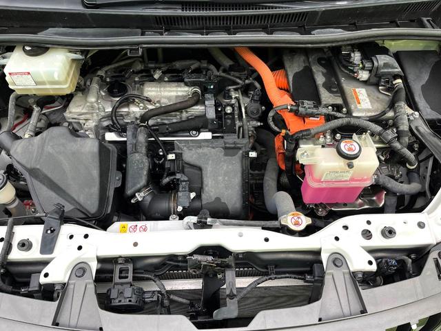 エスクァイア ハイブリッドGiプレミアムパッケジブラックテーラード 禁煙車 純正9型ナビ バックカメラ シートヒーター 両側電動スライドドア LEDヘッド セーフティセンス 純正15インチアルミ スマートキー ETC オートエアコン クルコン オートライト(18枚目)