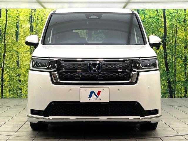 ステップワゴン ｅ：ＨＥＶスパーダ　登録済未使用車　純正１１．４型ナビ　バックカメラ　アダプティブクルーズコントロール　ブラインドスポットモニター　両側電動スライドドア　パワーバックドア　ＬＥＤヘッド　ハーフレザーシート　電子パーキング（15枚目）