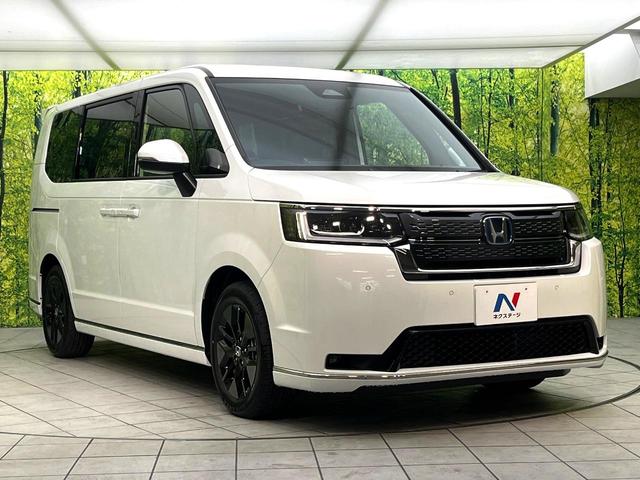 ステップワゴン ｅ：ＨＥＶスパーダ　登録済未使用車　純正１１．４型ナビ　バックカメラ　アダプティブクルーズコントロール　ブラインドスポットモニター　両側電動スライドドア　パワーバックドア　ＬＥＤヘッド　ハーフレザーシート　電子パーキング（17枚目）