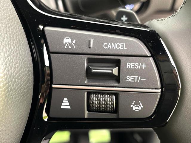 ステップワゴン ｅ：ＨＥＶスパーダ　登録済未使用車　純正１１．４型ナビ　バックカメラ　アダプティブクルーズコントロール　ブラインドスポットモニター　両側電動スライドドア　パワーバックドア　ＬＥＤヘッド　ハーフレザーシート　電子パーキング（26枚目）