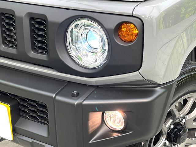 ジムニー ＸＣ　届出済未使用車　ターボ　４ＷＤ　スズキセーフティーサポート　スマートキー　シートヒーター　車線逸脱警報　ダウンヒルアシスト　純正１６インチアルミホイール　ＬＥＤヘッドライト　純正革巻きステアリング（12枚目）