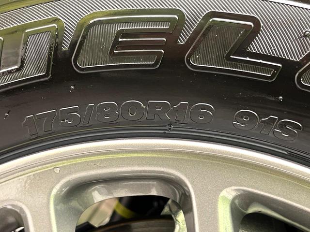 ジムニー ＸＣ　届出済未使用車　ターボ　４ＷＤ　スズキセーフティーサポート　スマートキー　シートヒーター　車線逸脱警報　ダウンヒルアシスト　純正１６インチアルミホイール　ＬＥＤヘッドライト　純正革巻きステアリング（48枚目）