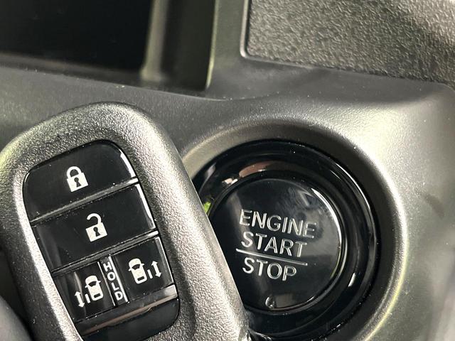 N-BOXカスタム ターボ ホンダセンシング 純正ディスプレイ バックカメラ パドルシフト シートヒーター 両側電動スライドドア LEDヘッド レーダークルーズ 純正15型アルミ 純正革巻ステアリング Bluetooth 禁煙車(25枚目)