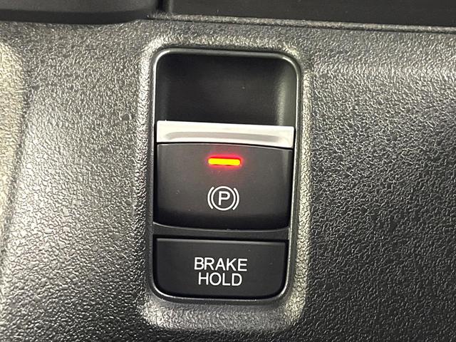 N-BOXカスタム ターボ ホンダセンシング 純正ディスプレイ バックカメラ パドルシフト シートヒーター 両側電動スライドドア LEDヘッド レーダークルーズ 純正15型アルミ 純正革巻ステアリング Bluetooth 禁煙車(27枚目)