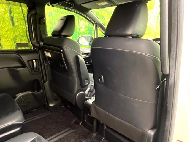 ヴォクシー ハイブリッドZS 煌III 禁煙車 純正9型ナビ フリップダウンモニター セーフティセンス バックカメラ 両側電動スライドドア シートヒーター ハーフレザーシート ETC 純正16インチアルミホイール スマートキー(27枚目)