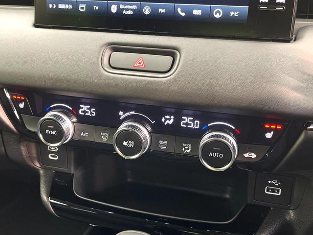 ヴェゼル e:HEV Z 登録済未使用車 9インチホンダコネクトディスプレイ 全周囲カメラ ETC2.0 電動リアゲート パドルシフト LEDヘッド フルセグTV 置くだけ充電 スマートキー シートヒーター オートライト(35枚目)