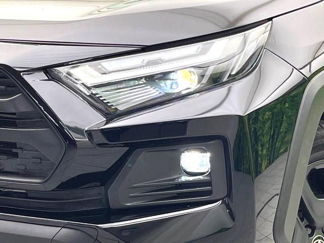 RAV4 ハイブリッドアドベンチャー 禁煙車 全周囲カメラ 9インチディスプレイ シートベンチレーション パワーバックドア セーフティセンス シートメモリー ブラインドスポット 4WD パワーシート ステアリングヒーター スマートキー(12枚目)