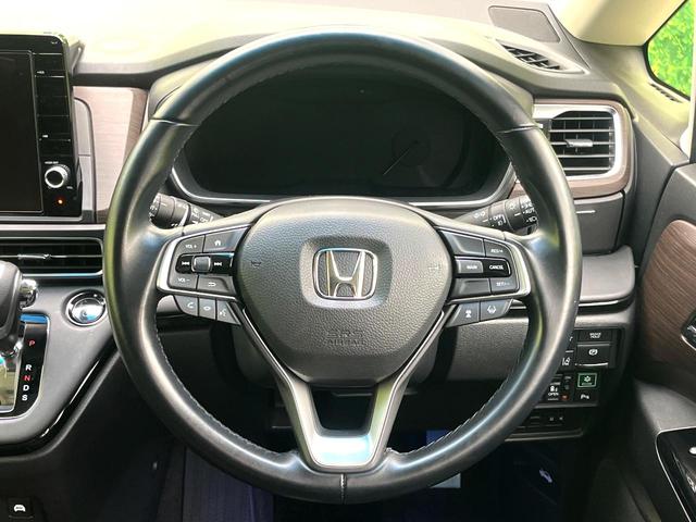 オデッセイハイブリッド e:HEVアブソルート・EX 後席モニター 純正10インチナビ 全周囲カメラ 両側電動スライドドア ブラインドスポットモニター ホンダセンシング ETC2.0 パワーシート シートヒーター 電動リアゲート スマートキー 禁煙車(11枚目)
