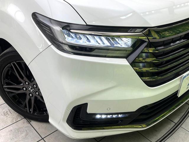 オデッセイハイブリッド e:HEVアブソルート・EX 後席モニター 純正10インチナビ 全周囲カメラ 両側電動スライドドア ブラインドスポットモニター ホンダセンシング ETC2.0 パワーシート シートヒーター 電動リアゲート スマートキー 禁煙車(12枚目)