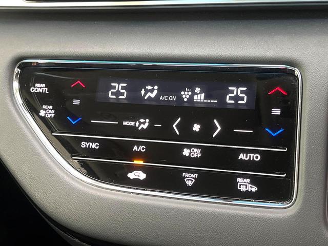 オデッセイハイブリッド e:HEVアブソルート・EX 後席モニター 純正10インチナビ 全周囲カメラ 両側電動スライドドア ブラインドスポットモニター ホンダセンシング ETC2.0 パワーシート シートヒーター 電動リアゲート スマートキー 禁煙車(24枚目)