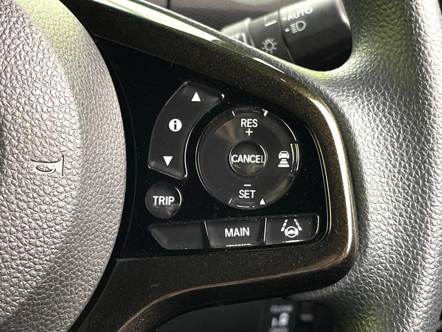 N-BOXカスタム G・Lホンダセンシング 禁煙車 純正ナビ バックカメラ アダプティブクルーズコントロール パワースライドドア 車線逸脱警報 LEDヘッド 純正14インチアルミホイール 横滑り防止装置 ETC スマートキー(4枚目)