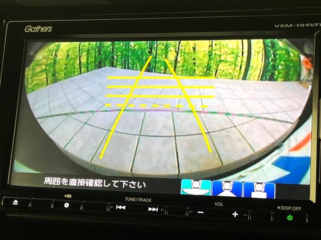 N-BOXカスタム G・Lホンダセンシング 禁煙車 純正ナビ バックカメラ アダプティブクルーズコントロール パワースライドドア 車線逸脱警報 LEDヘッド 純正14インチアルミホイール 横滑り防止装置 ETC スマートキー(6枚目)