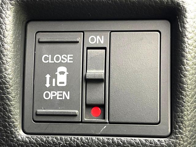 N-BOXカスタム G・Lホンダセンシング 禁煙車 純正ナビ バックカメラ アダプティブクルーズコントロール パワースライドドア 車線逸脱警報 LEDヘッド 純正14インチアルミホイール 横滑り防止装置 ETC スマートキー(7枚目)