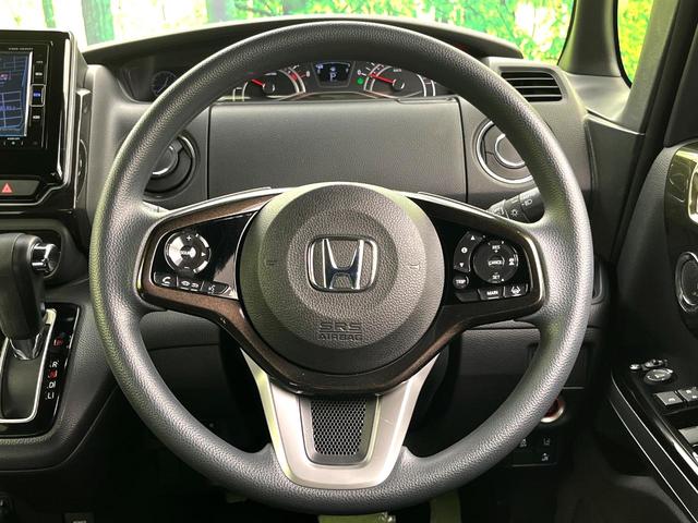 N-BOXカスタム G・Lホンダセンシング 禁煙車 純正ナビ バックカメラ アダプティブクルーズコントロール パワースライドドア 車線逸脱警報 LEDヘッド 純正14インチアルミホイール 横滑り防止装置 ETC スマートキー(11枚目)