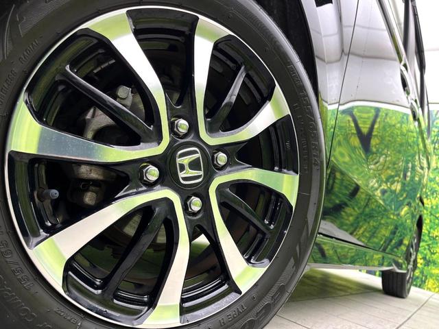 N-BOXカスタム G・Lホンダセンシング 禁煙車 純正ナビ バックカメラ アダプティブクルーズコントロール パワースライドドア 車線逸脱警報 LEDヘッド 純正14インチアルミホイール 横滑り防止装置 ETC スマートキー(13枚目)