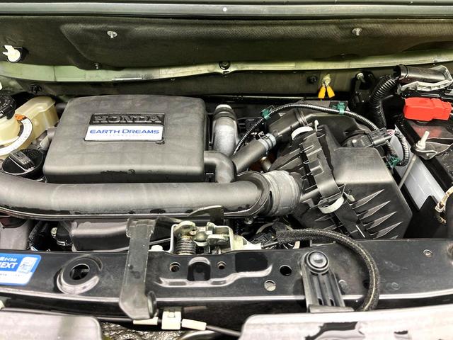 N-BOXカスタム G・Lホンダセンシング 禁煙車 純正ナビ バックカメラ アダプティブクルーズコントロール パワースライドドア 車線逸脱警報 LEDヘッド 純正14インチアルミホイール 横滑り防止装置 ETC スマートキー(18枚目)