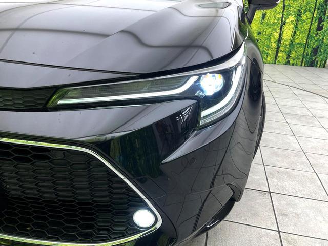 カローラツーリング ハイブリッド ダブルバイビー 禁煙車 メーカー純正ディスプレイ バックカメラ レーダークルーズコントロール セーフティセンス スマートキー 電子パーキング オートブレーキホールド ETC ハーフレザーシート オートライト(12枚目)