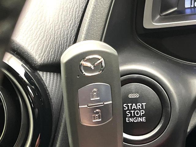 デミオ １３Ｓ　禁煙車　純正ナビ　バックカメラ　衝突軽減ブレーキ　スマートキー　ＬＥＤヘッドライト　純正１５インチアルミ　オートエアコン　電動格納ミラー　パワーウィンドウ　オートライト　ＥＴＣ（7枚目）