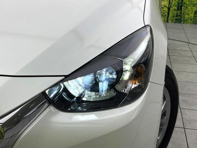 デミオ １３Ｓ　禁煙車　純正ナビ　バックカメラ　衝突軽減ブレーキ　スマートキー　ＬＥＤヘッドライト　純正１５インチアルミ　オートエアコン　電動格納ミラー　パワーウィンドウ　オートライト　ＥＴＣ（12枚目）