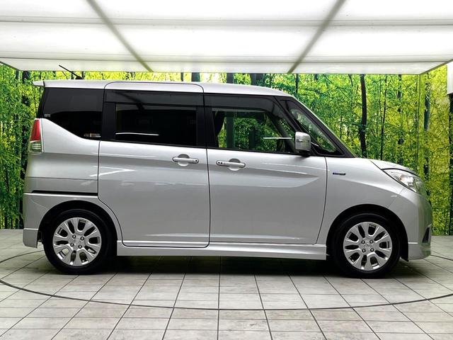 ソリオ ハイブリッドＭＺ　禁煙車　ナビ　バックカメラ　両側パワースライドドア　スズキセーフティー　レーダークルーズコントロール　ＨＩＤライト　フォグランプ　純正１５インチアルミホイール　プッシュスタート　後席シェード（27枚目）
