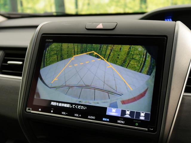フリードハイブリッド ハイブリッド・Ｇブラックスタイル　禁煙車　純正９型ナビ　両側電動スライドドア　バックカメラ　ホンダセンシング　ドラレコ　コーナーセンサー　スマートキー　ＬＥＤヘッド　ビルトインＥＴＣ　オートライト　オートエアコン（5枚目）