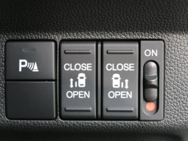 フリードハイブリッド ハイブリッド・Ｇブラックスタイル　禁煙車　純正９型ナビ　両側電動スライドドア　バックカメラ　ホンダセンシング　ドラレコ　コーナーセンサー　スマートキー　ＬＥＤヘッド　ビルトインＥＴＣ　オートライト　オートエアコン（6枚目）