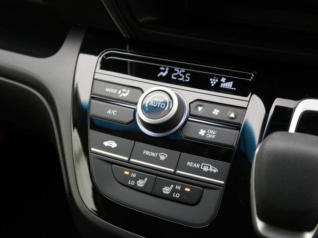 フリードハイブリッド ハイブリッド・Ｇブラックスタイル　禁煙車　純正９型ナビ　両側電動スライドドア　バックカメラ　ホンダセンシング　ドラレコ　コーナーセンサー　スマートキー　ＬＥＤヘッド　ビルトインＥＴＣ　オートライト　オートエアコン（27枚目）