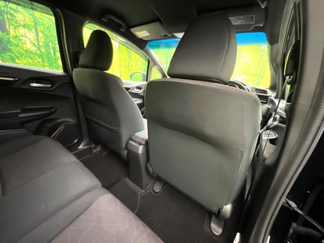 フィットハイブリッド Ｓパッケージ　禁煙車　純正ナビ　バックカメラ　衝突軽減ブレーキ　クルコン　スマートキー　ＨＩＤヘッド　純正１６インチアルミ　オートライト　オートエアコン　パドルシフト　ＥＴＣ　ＢＬＵＥＴＯＯＴＨ（38枚目）